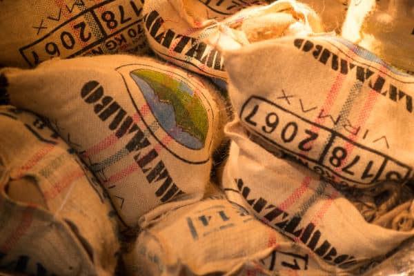 pile of burlap coffee bags