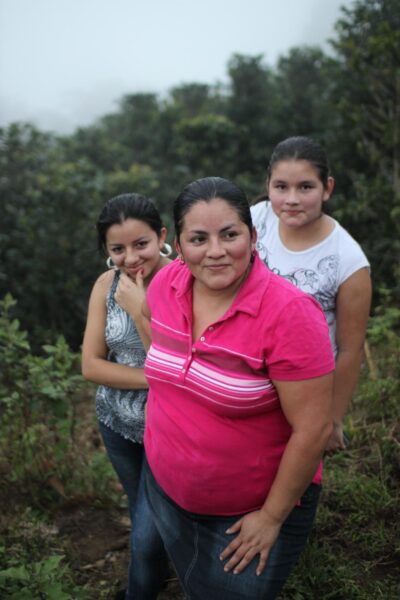 Santos Alexis Domínguez and daughters on farm